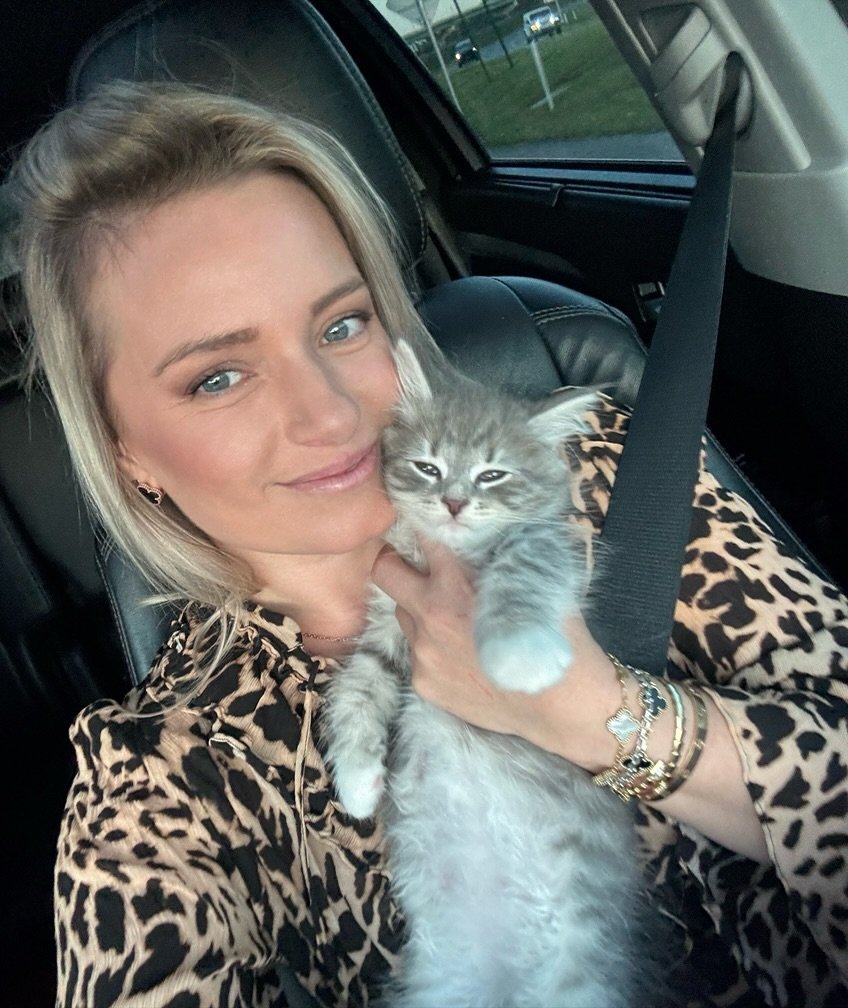 Hannah and Mark Thomas with Siberian cats